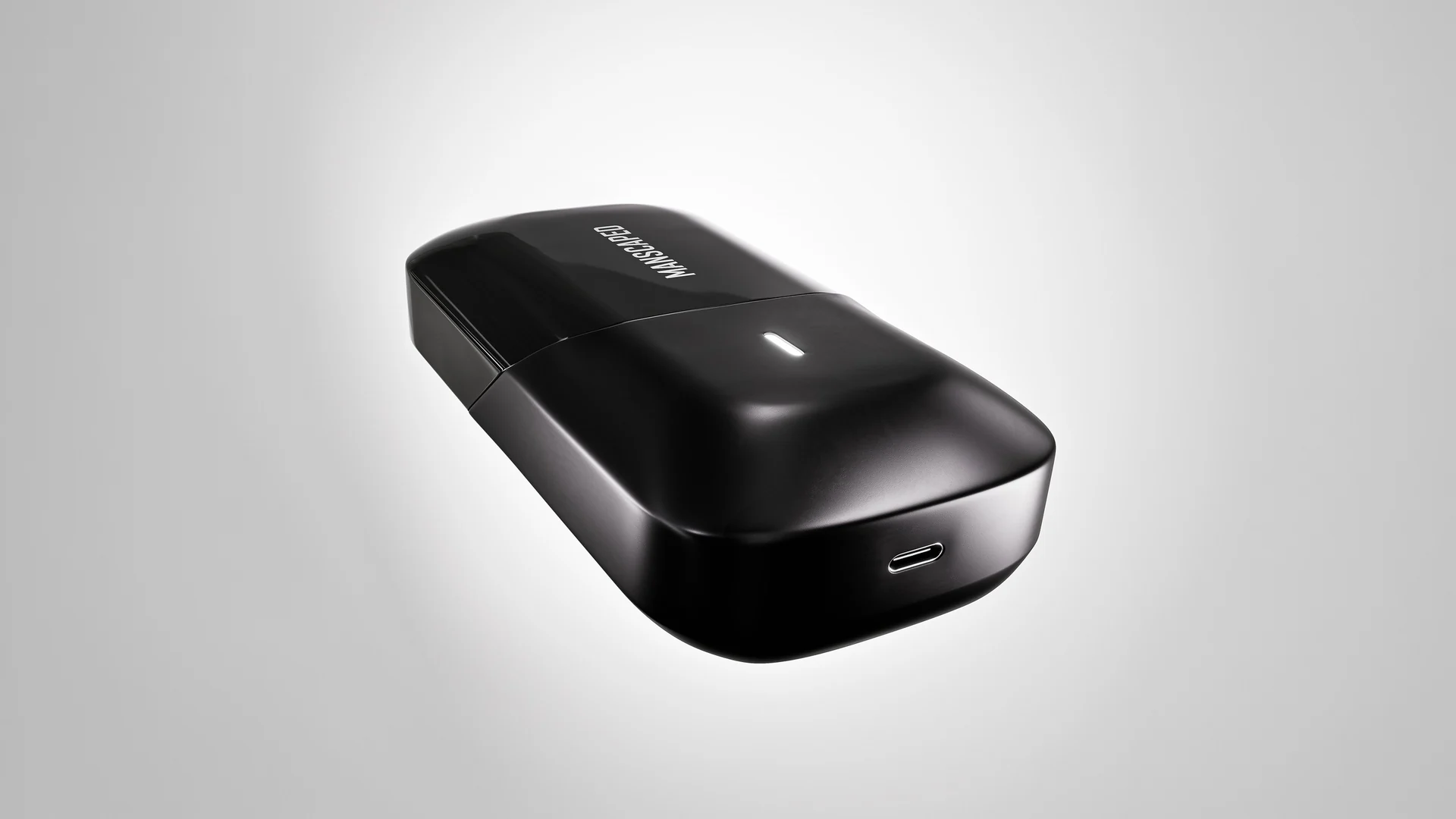 Barbeador Handyman deitado mostrando a entrada USB-C